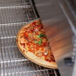 In industrial pizza production, the reliability of transmission systems is essential
